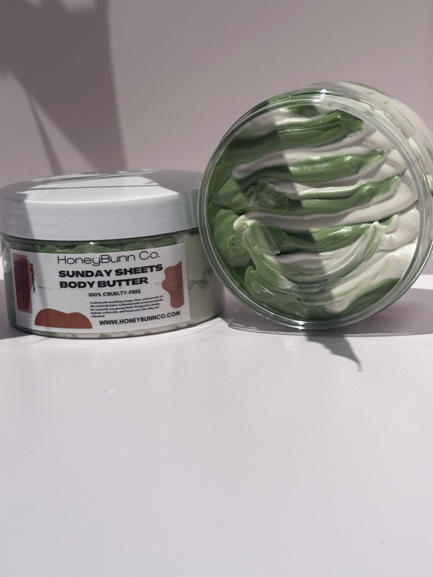 Jar of Honeyburn Co. Sunday Sheets Body Butter with a visible label on a white background